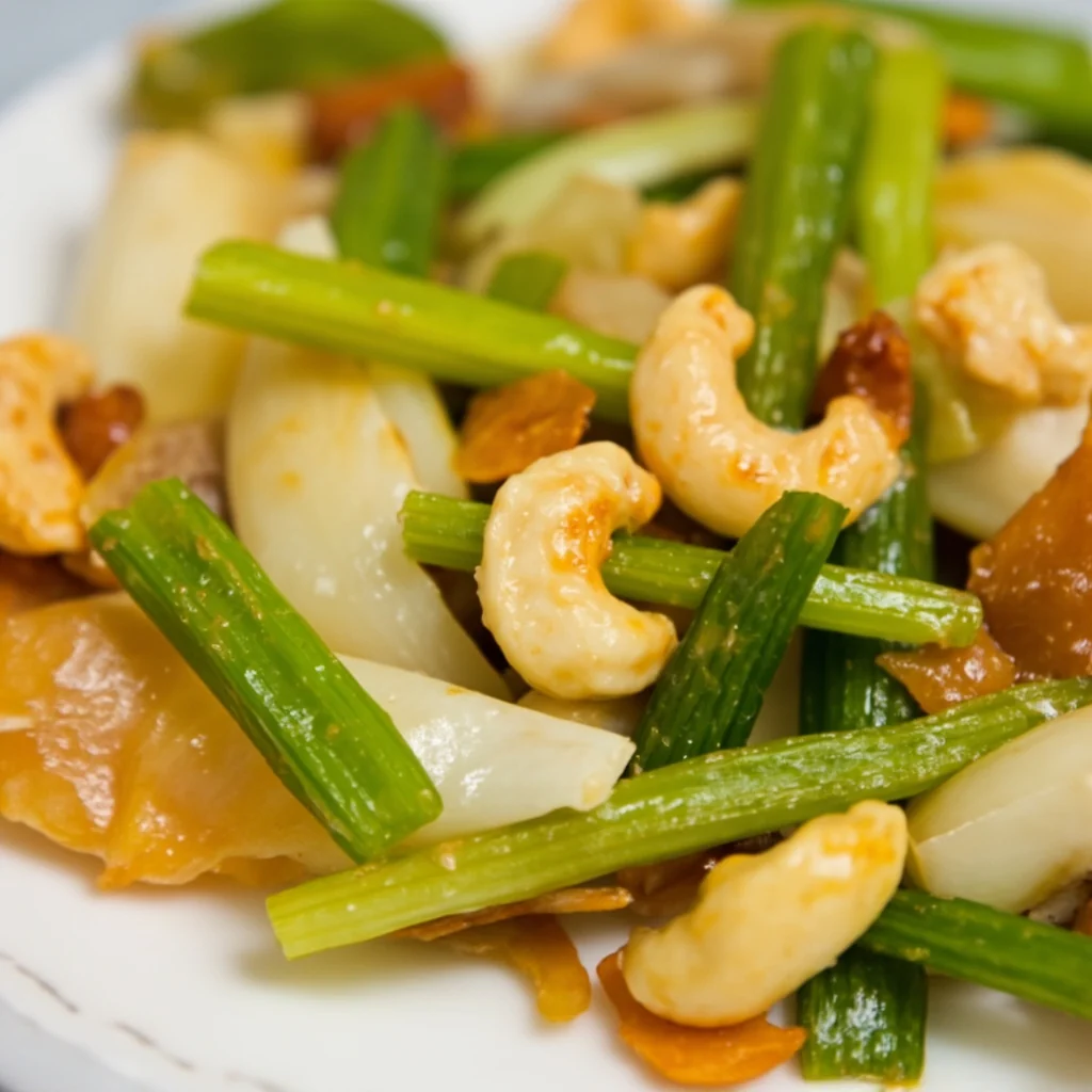 Sauté de céleri, bulbe de lis et noix de cajou